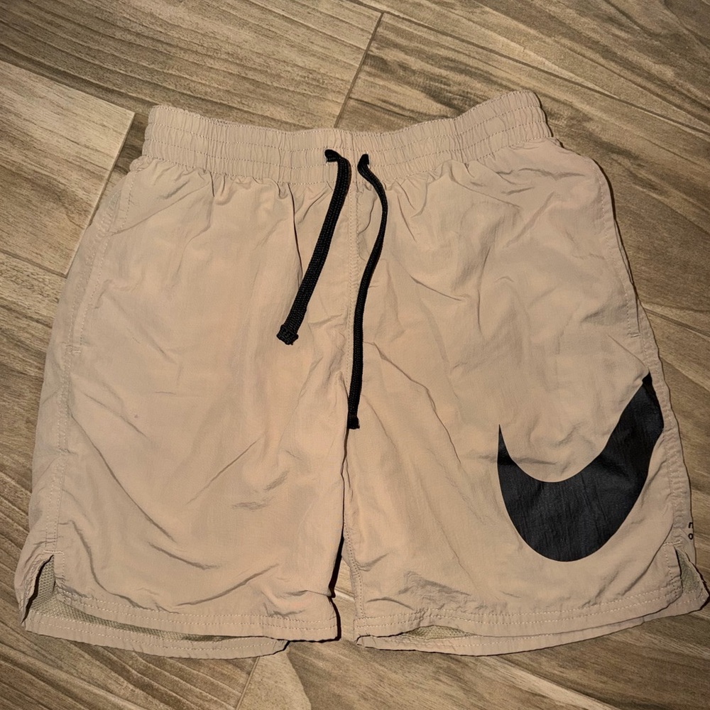Nike Tan Athletic Shorts with Black Swoosh
